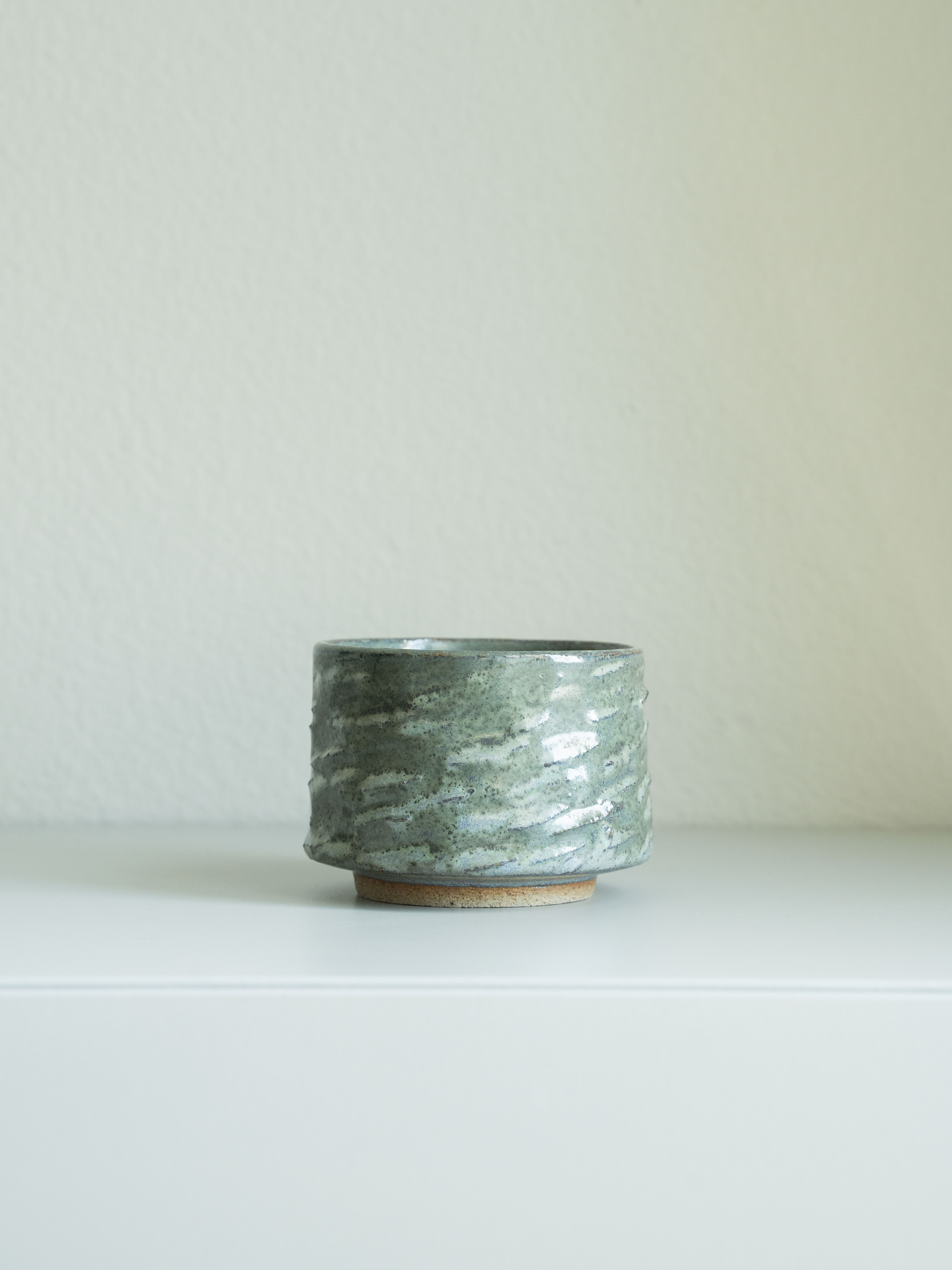 Celadon Carved Tea Cup, detail 1