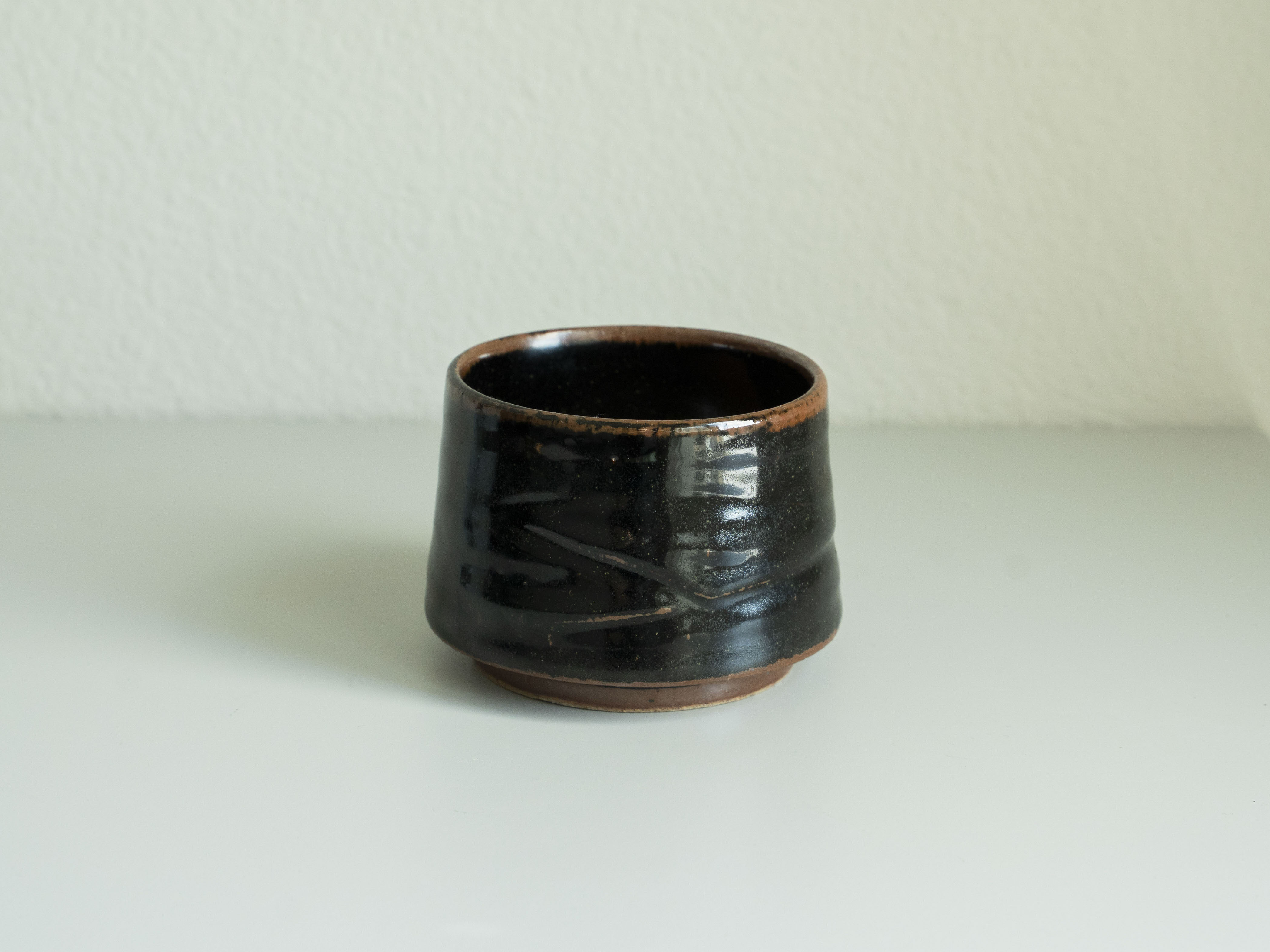 Black Glazed Carved Tea Cup, main view