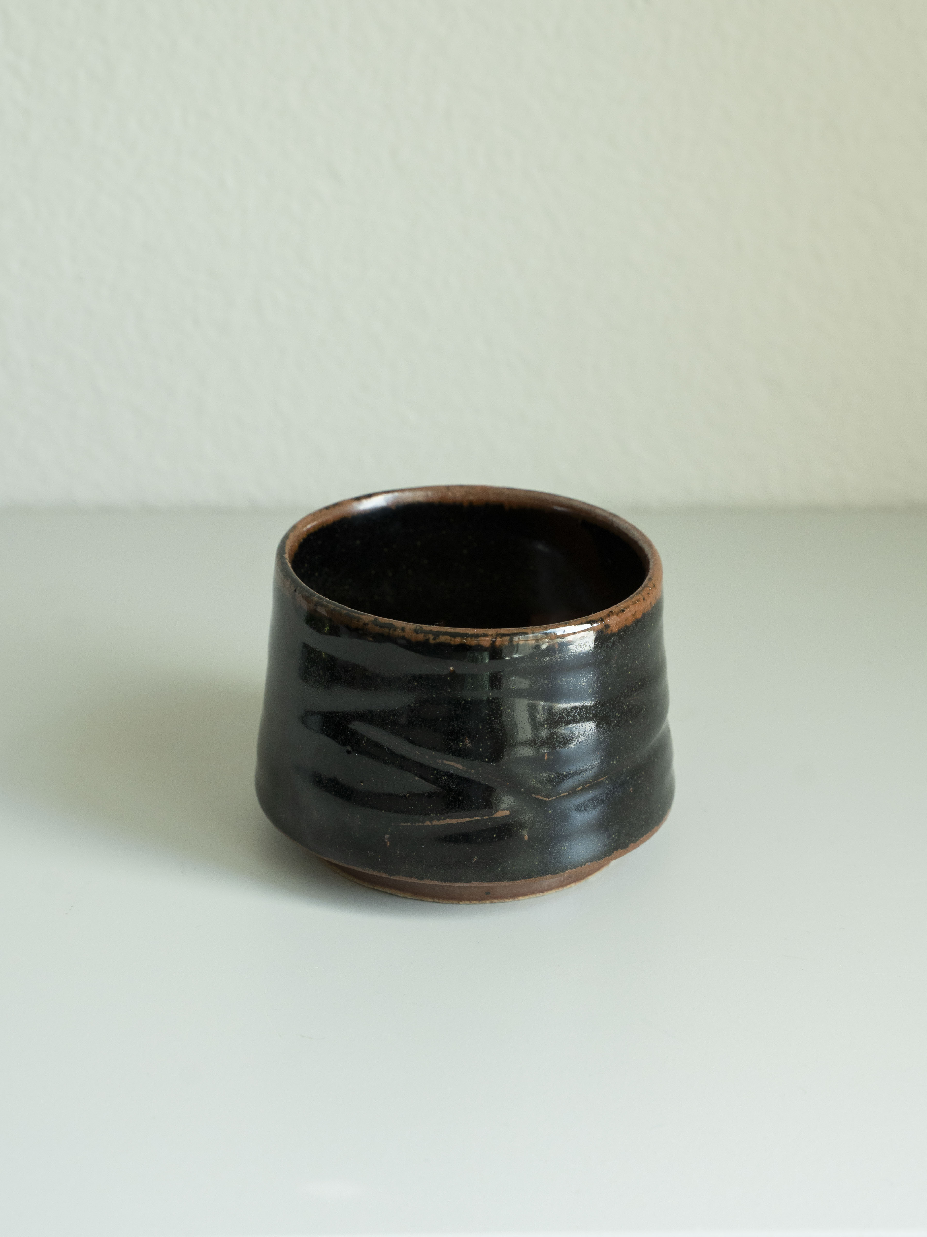 Black Glazed Carved Tea Cup, detail 1
