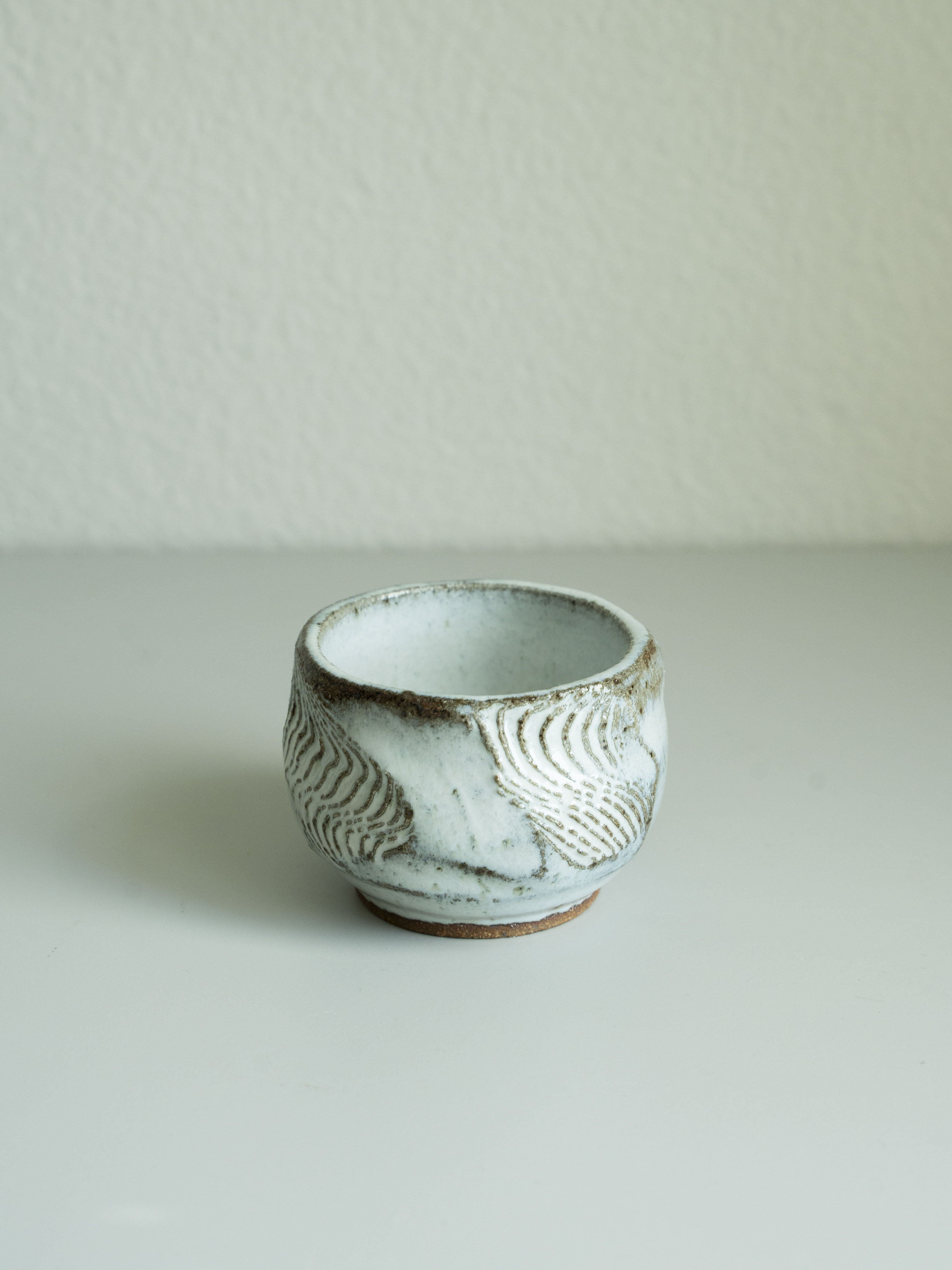 White Glazed Carved Tea Cup, detail 4