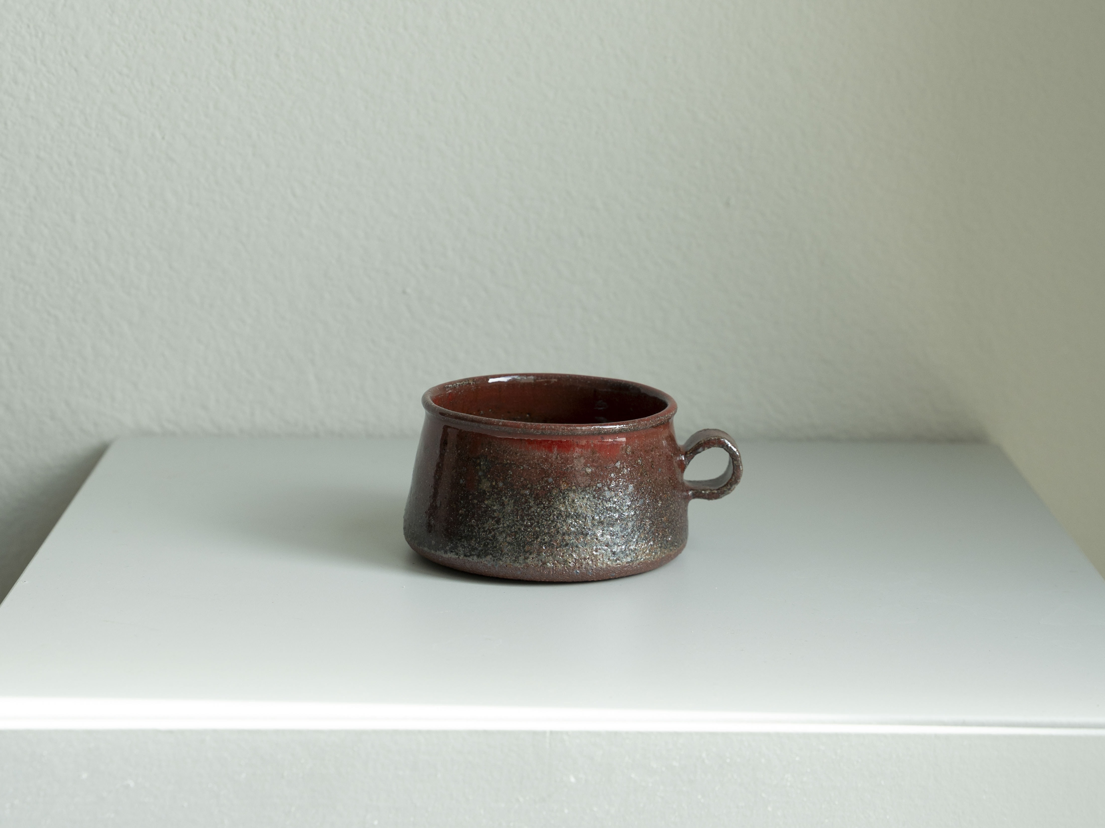 Iron Red Handled Tea Cup, main view