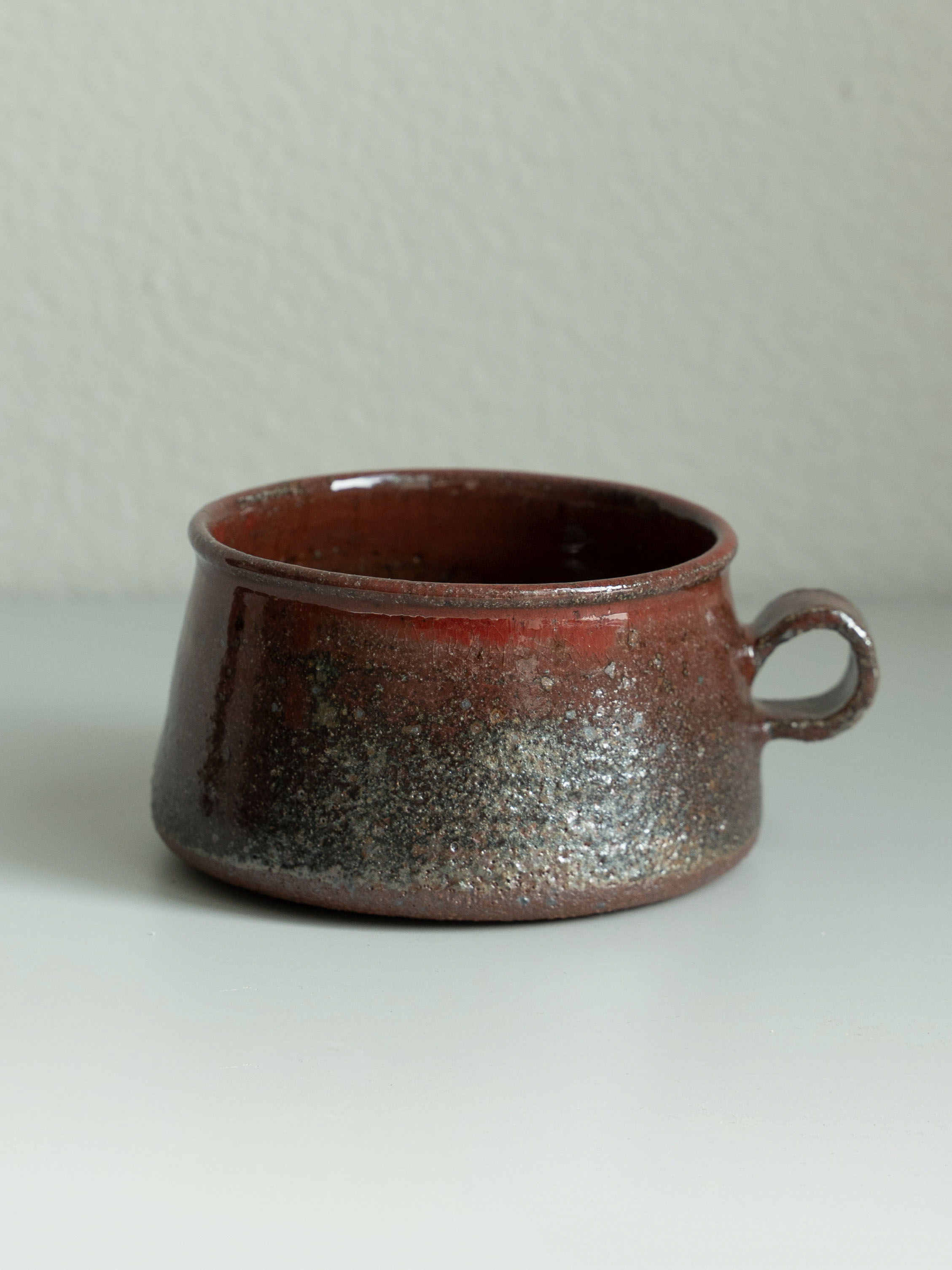 Iron Red Handled Tea Cup, detail 1
